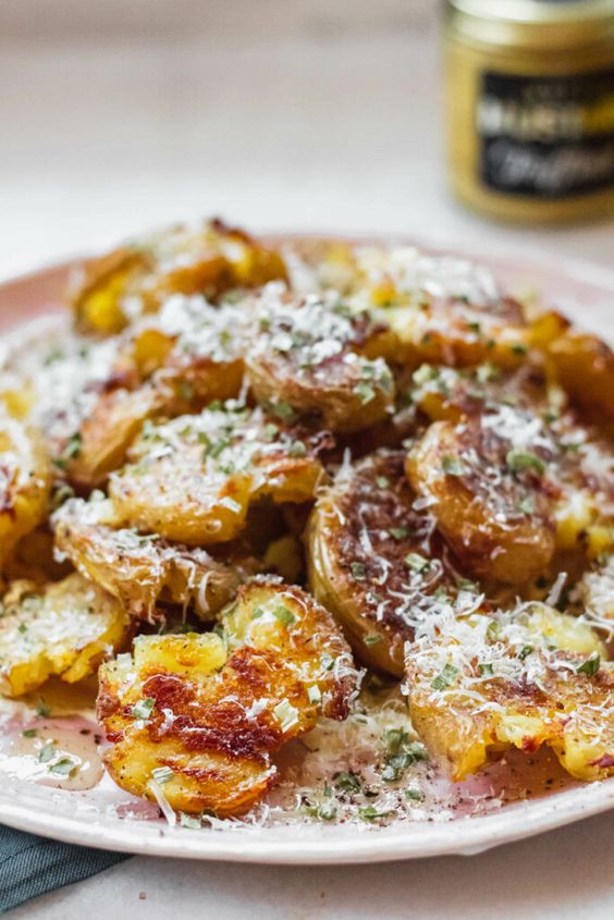 Crispy truffle smashed potatoes using Gusto's Truffle Oil and Truffle Hot Sauce